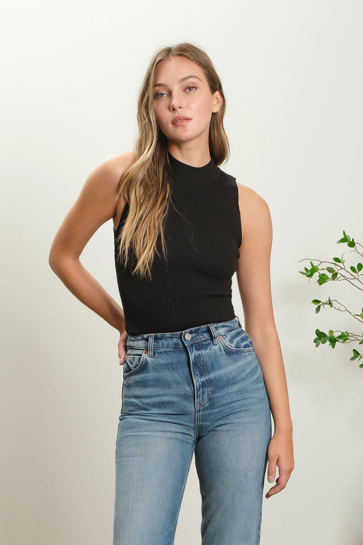 sleeveless ribbed mock neck knit top