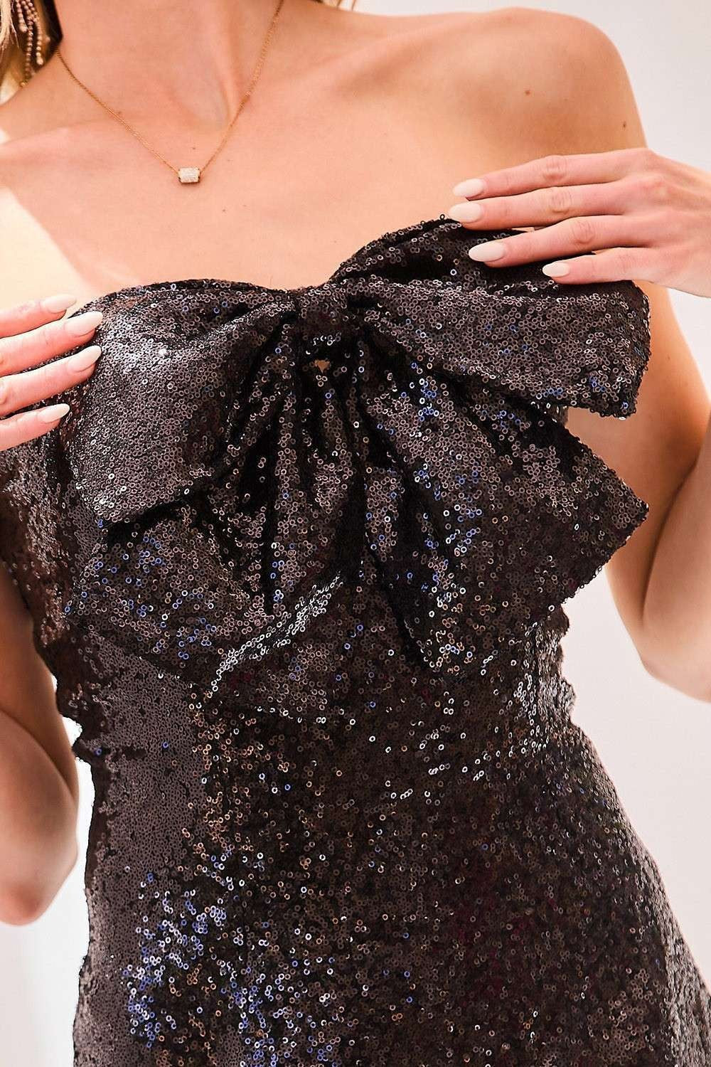 sequin bow bust strapless dress